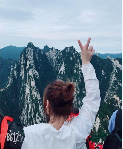 Debbie on top of the mountain.